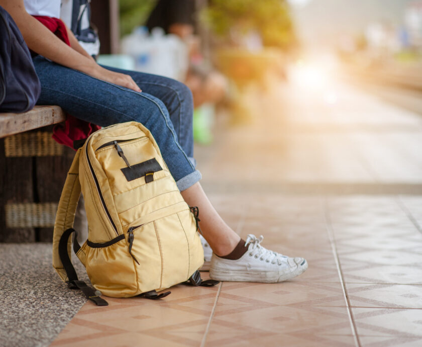 Traveler Woman Waits Train On Railway Platform.
