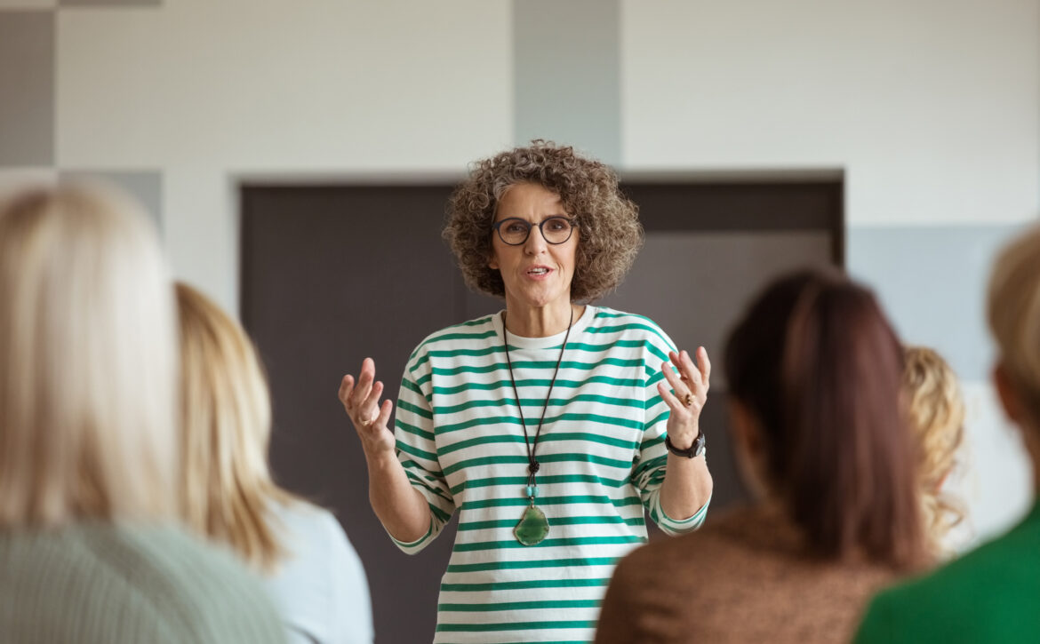 Woman Sharing Experience During Seminar