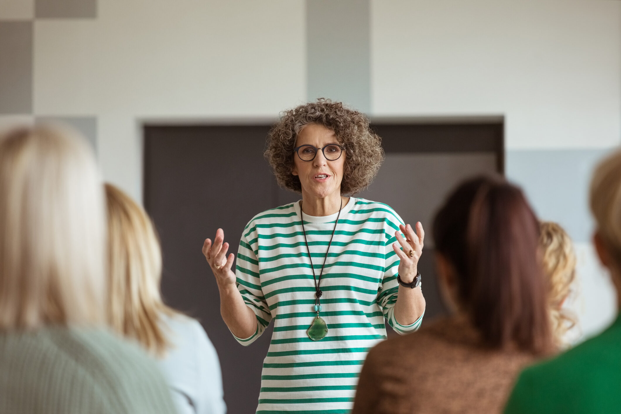 Woman Sharing Experience During Seminar